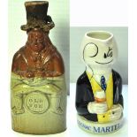 A salt glazed "Old Tom" flask and a Martell Cognac jug (2). CONDITION REPORT Some wear