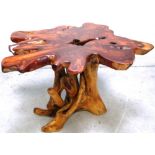 A sculptural tree root dining table, height 73 x length 120cm.