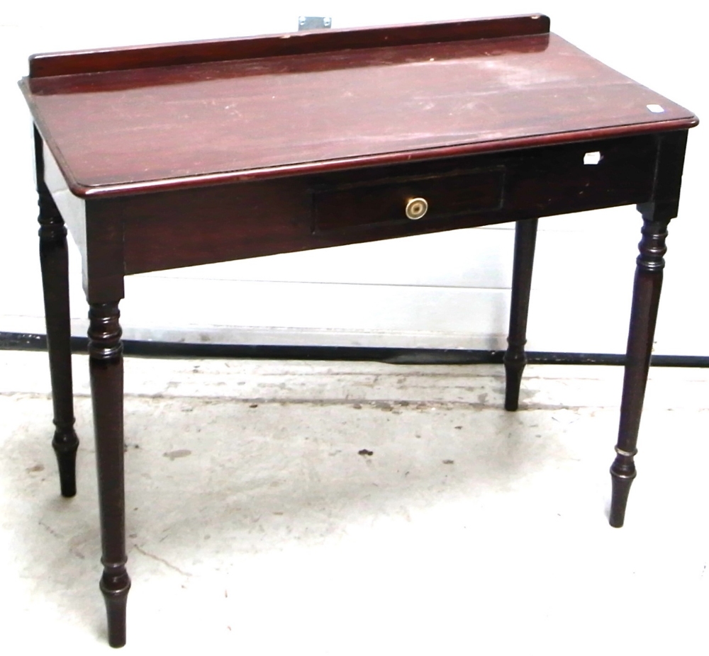 A Victorian mahogany hall table on ring turned legs with central drawer, width 90cm.