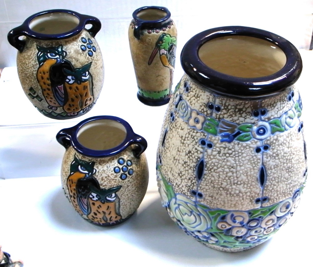 Four various pieces of Czechoslovakian amphora ware to include a beige ground and florally