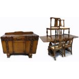 A 20th century draw leaf oak dining table, four dining chairs and a 20th century oak sideboard,