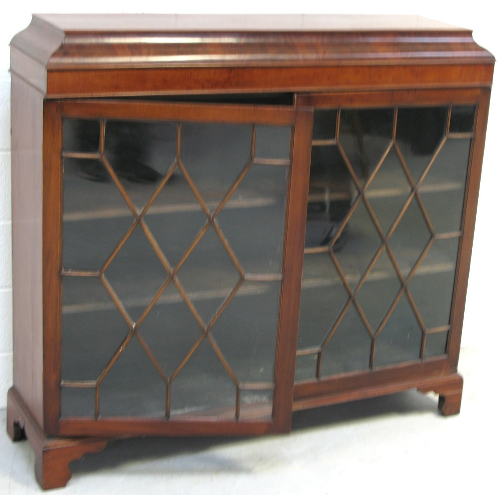 An Edwardian mahogany display cabinet with astragal glazed doors, length 190cm.