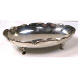 A George V hallmarked silver oval dish on four supports, Sheffield 1936, approx weight 14.1ozt.