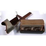 A stereoscope and a box of stereoscopic photographs relating to Victorian era foreign travel,