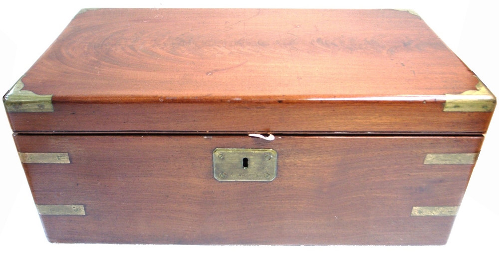 An early 20th century mahogany writing box with brass decoration.