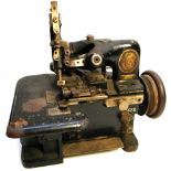 A 19th century Singer sewing machine, model EK331628.