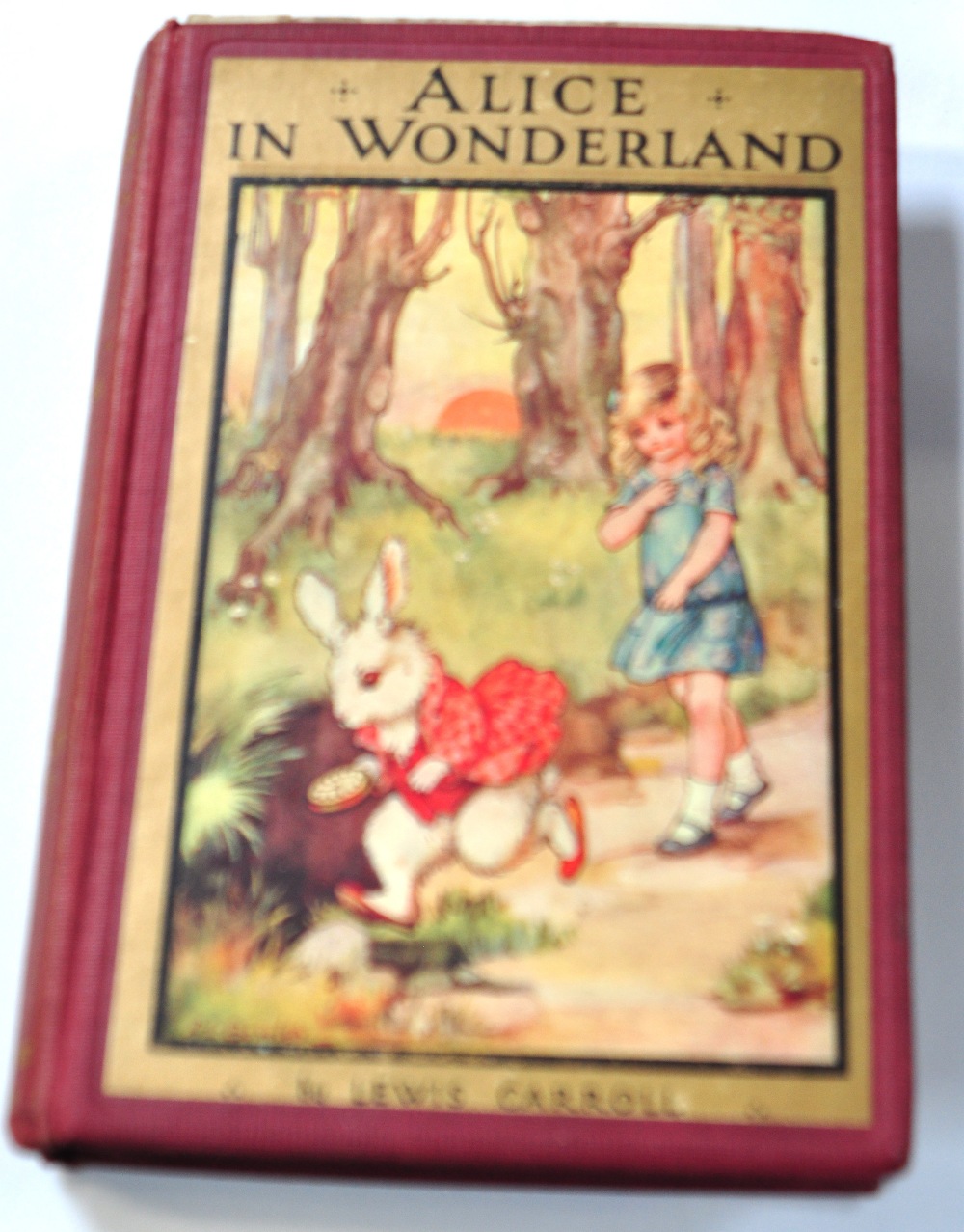 Lewis Carroll; Alice in Wonderland with illustrations and full page colour plates by A.L.