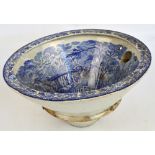 A 19th century blue and white transfer decorated toilet bowl depicting Warwick Castle, length