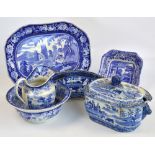 A collection of 19th century English blue and white transfer decorated ware including a rounded