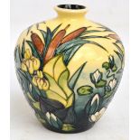 A Moorcroft vase of squat baluster form in "Lamia" pattern, impressed mark and leaf, signed and