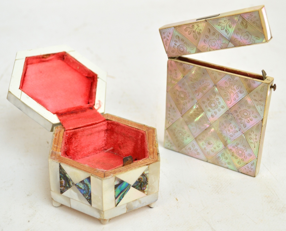 A Victorian mother of pearl card case of rectangular form with floral decoration etched to each - Image 2 of 3