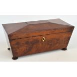 A large George mahogany sarcophagus shaped tea caddy,