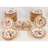 A quantity of 19th century ironstone dinner ware comprising four graduated oval meat plates, an