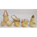 A collection of Locke & Co Worcester ceramics comprising two basket work butter dishes, one in a