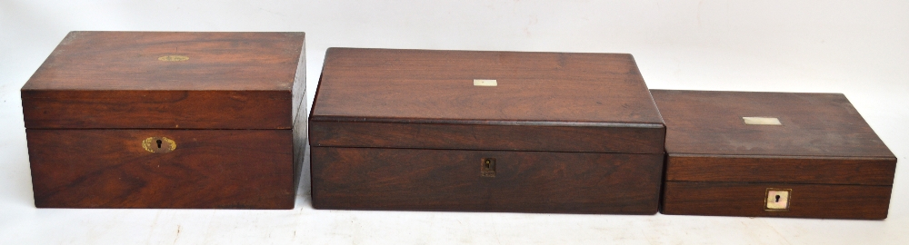 A late 19th century rosewood writing box with square escutcheon and cartouche,