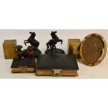 A pair of brass tea caddies of square sections, an Art Nouveau style oval photo frame, 26.