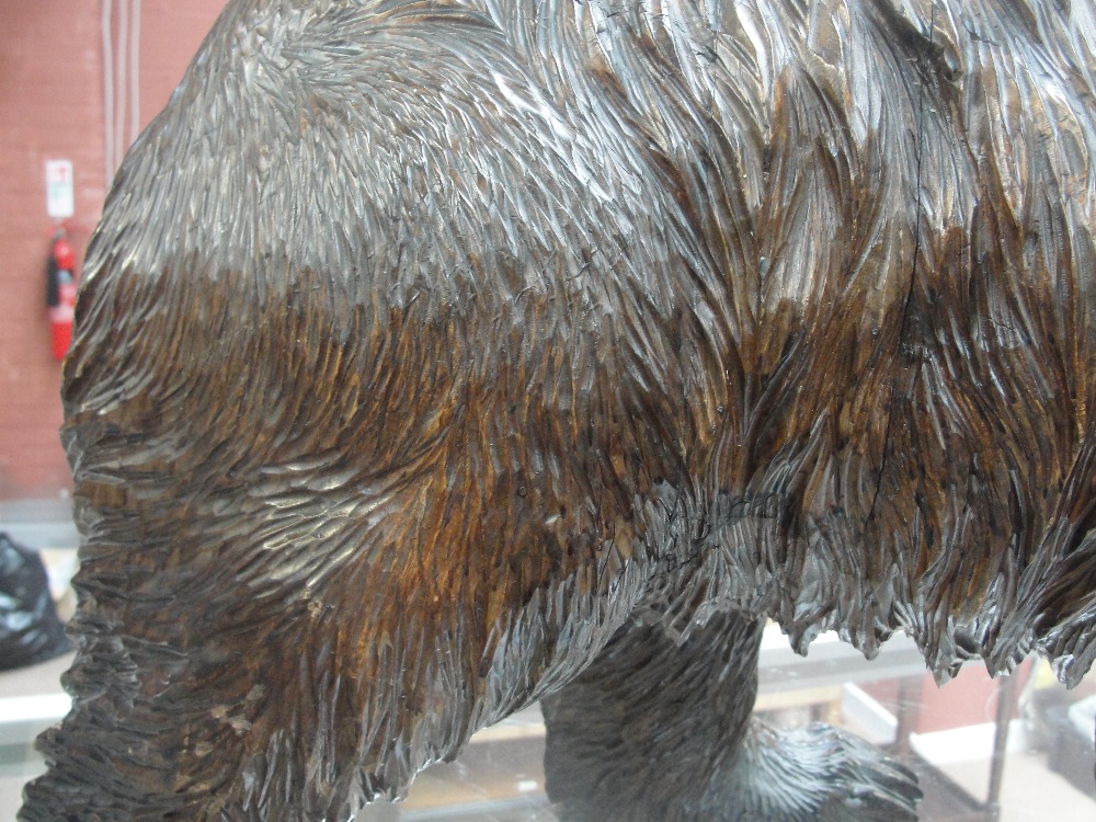 A large late 19th century Black Forest carved figure of a bear standing four square with open - Image 6 of 9