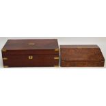A Victorian mahogany brass bound writing slope, the leather lined interior with compartments for