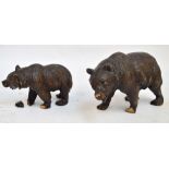 A late 19th century Black Forest carved figure of a bear, standing four square, length 23cm,