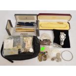 Three cased Parker fountain pens, an Elysse cased fountain pen and pen set, a pearl bead necklace,