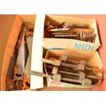 A large quantity of vintage woodworking tools including various sized wood planes including an