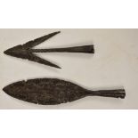 A Medieval iron socketed arrow head with leaf shaped blade and a Medieval iron arrow head with