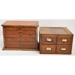 A small stained pine collector's/tool cabinet with six shallow drawers, raised on shaped plinth,