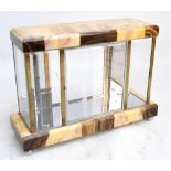 A French Art Deco style mirrored onyx and brass mounted table top display case,