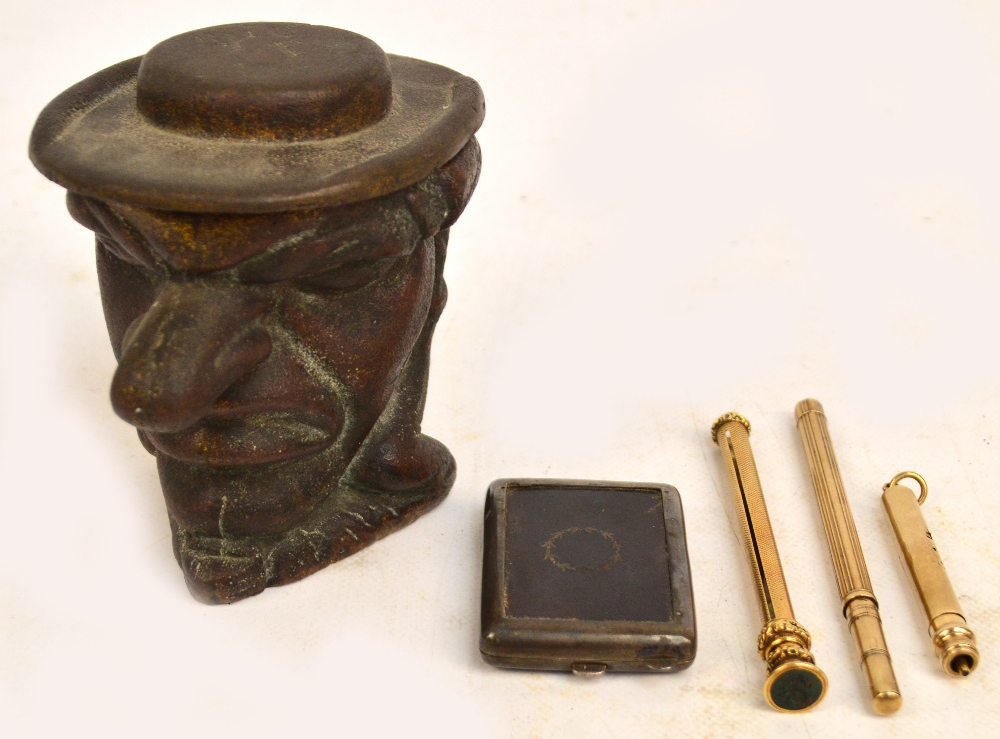 A yellow metal propelling pencil with overall engine turned decoration with cast set with hardstone