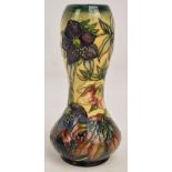 A modern Moorcroft tall gourd vase in "Hellebore" pattern by Nicola Slaney,