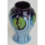 A Moorcroft baluster vase in "Cinco Blue" pattern, with tube line decoration,