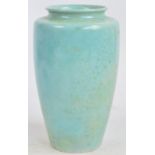 RUSKIN; a mottled green lustre glazed vase, impressed marks to base, dated 1928, height 21.5cm.