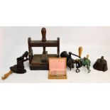 A 19th century wooden press stamped "M. Milner", a marmalade cutter, a bean slicer, a grinder and