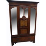 A late 19th early 20th century mahogany and walnut wardrobe,