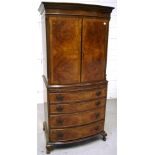 A walnut linen cupboard,