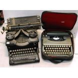 A vintage Royal typewriter and a cased Empire Corona typewriter (2).