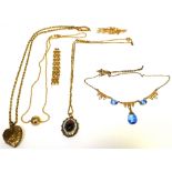 A small quantity of gold and yellow metal jewellery to include necklaces, a brooch etc.