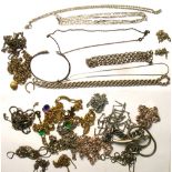 A quantity of silver, white metal and yellow metal jewellery to include necklaces, a bracelet etc.