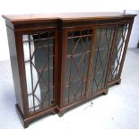 A large part glazed four door mahogany display cabinet on bracket feet, width 185cm.