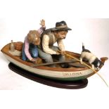 A Lladro figure group, 12351, "Fishing with Gramps", width 40cm, with original base and box.