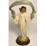 A Lladro figurine, 12241, "Winged Harmony", height 34cm, with original base and box. CONDITION