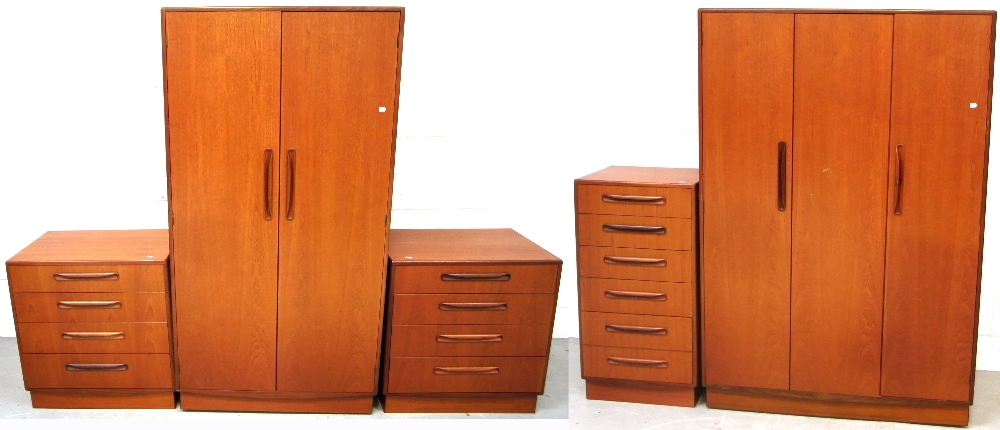 A five piece G Plan bedroom suite comprising a triple wardrobe, a double wardrobe,