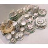 A quantity of Minton Haddon Hall pattern dinnerware to include plates, cups, saucers etc.
