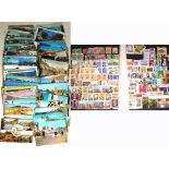 A quantity of 20th century British and World stamps and postcards,