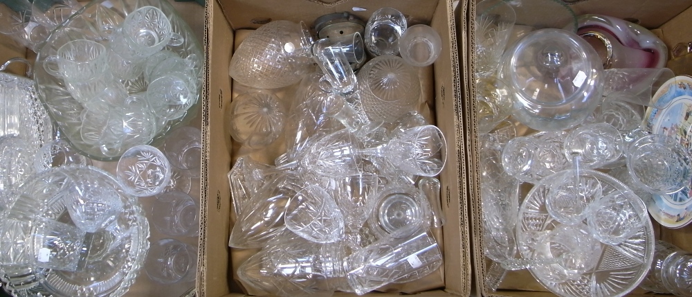A quantity of pressed glass and crystal to include a large punch bowl.