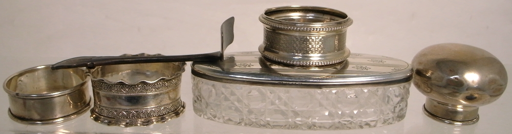 A small quantity of hallmarked silver napkin rings and other assorted items, various hallmarks.