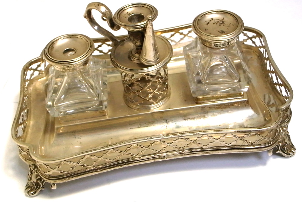 A Victorian hallmarked silver desk ink stand, Sheffield 1845, with central pen holder flanked by two