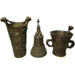 Three various pieces of Belgian bronzeware; a pestle and mortar, a miniature bucket and a bell,