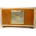 A Morath Bros. Liverpool retro wood case clock with baton numerals.