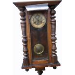 A late 19th early 20th century Vienna style wall clock, dial set with Roman numerals,